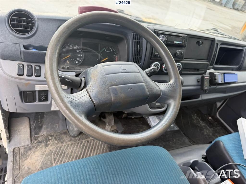 Mitsubishi Fuso Canter 4x2 with rear-mounted crane. Recently Kranbil
