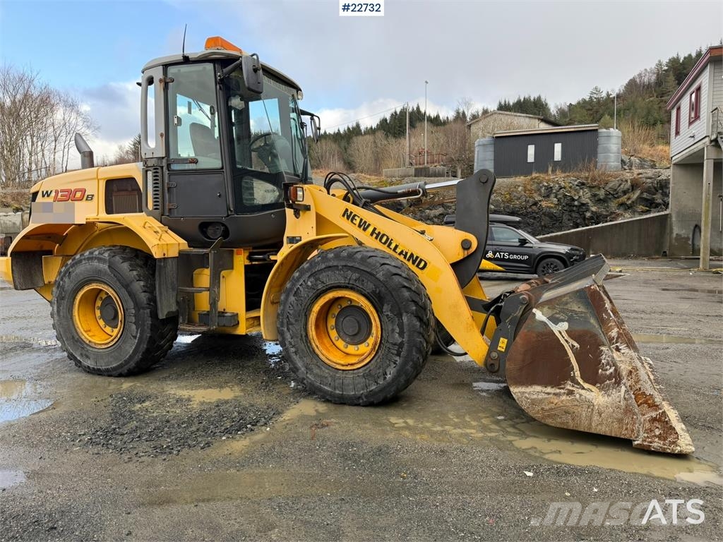 New Holland W130B wheel loader with a bucket