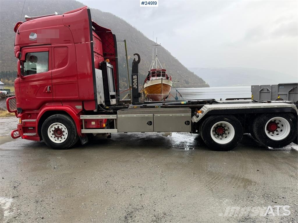 Scania R580 Hooklift truck with 20-tonne hooklift system Rol kiper kamioni sa kukom za podizanje tereta
