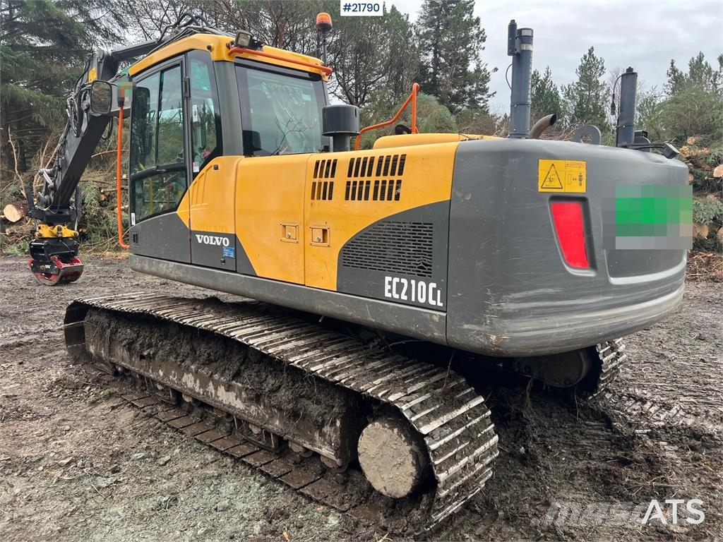 Volvo ec210cl excavator w/ rototilt, sanding bucket and  Escavadoras de rastos