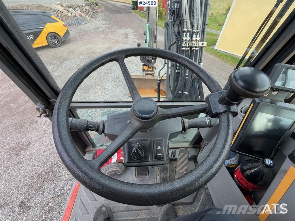 Volvo EW60E Wheeled excavator with tiltrotator and 2 buc Hjulgravere