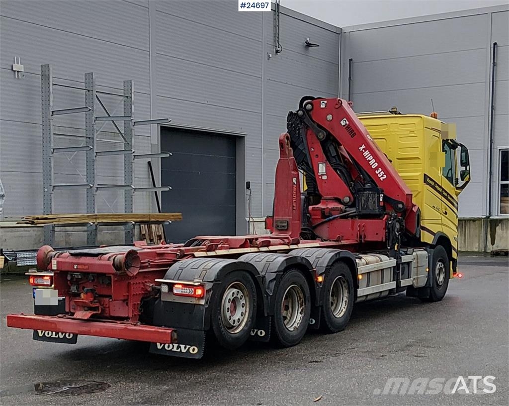 Volvo FH540 8x4 Tridem truck with 35 tm Hiab crane and 2 Camiones grúa