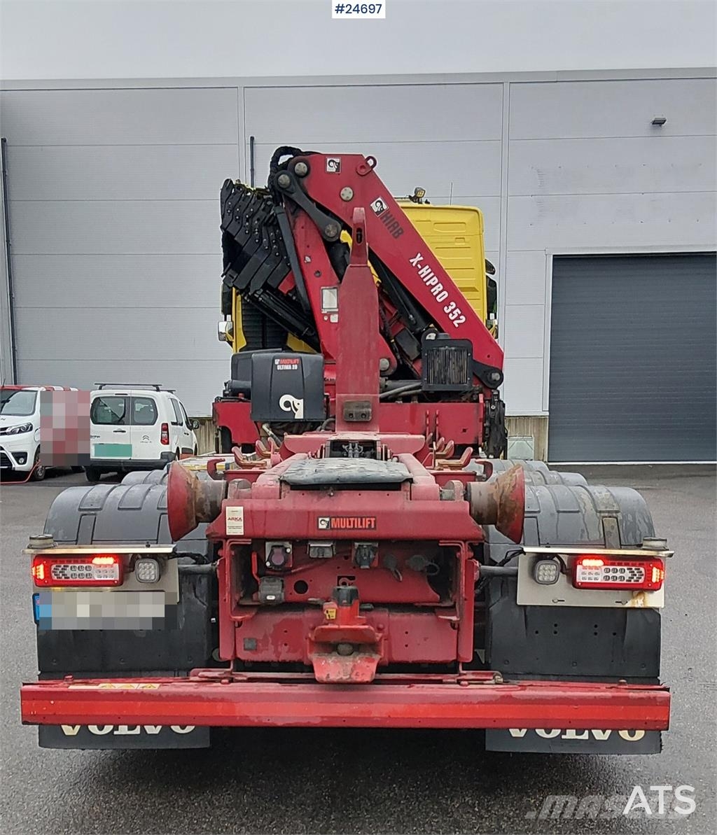 Volvo FH540 8x4 Tridem truck with 35 tm Hiab crane and 2 Camiones grúa