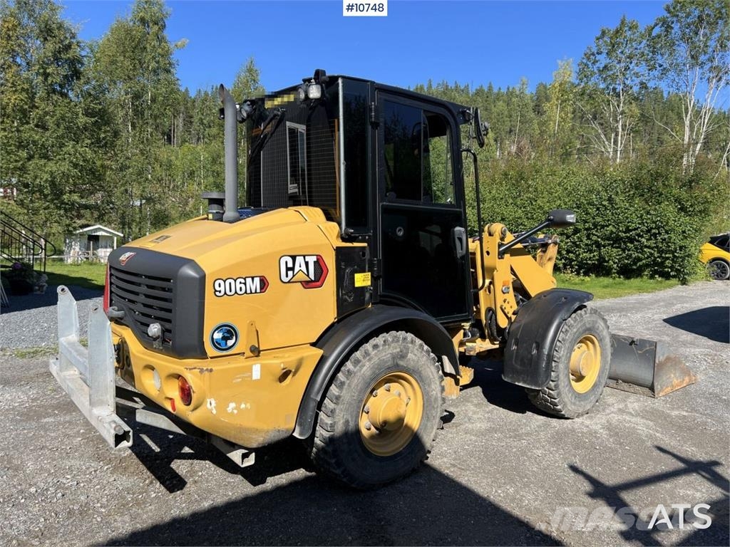 CAT 906M Wheel Loader with Multiple Attachments لوادر بعجل