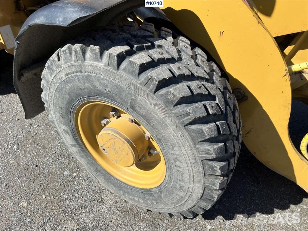CAT 906M Wheel Loader with Multiple Attachments لوادر بعجل
