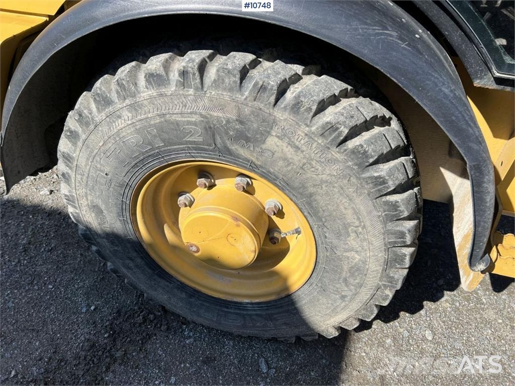 CAT 906M Wheel Loader with Multiple Attachments لوادر بعجل