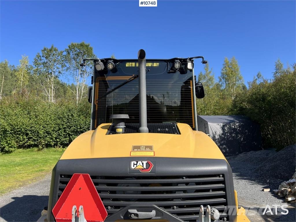 CAT 906M Wheel Loader with Multiple Attachments لوادر بعجل