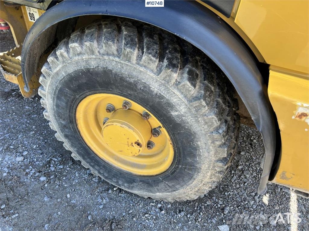 CAT 906M Wheel Loader with Multiple Attachments لوادر بعجل