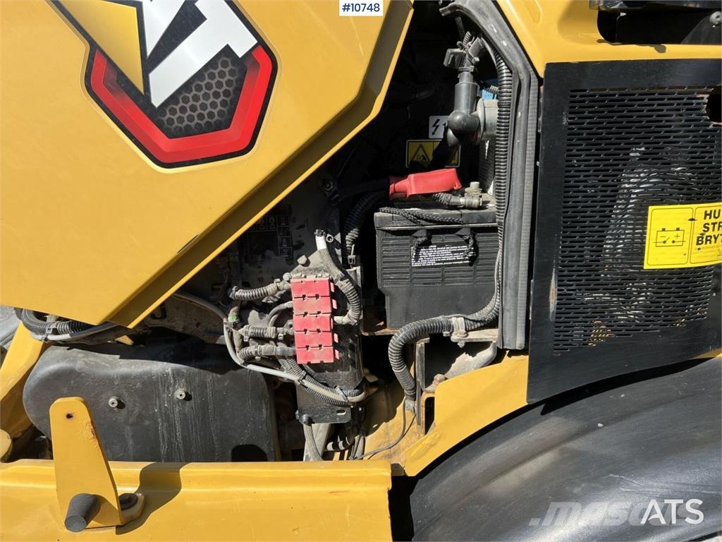 CAT 906M Wheel Loader with Multiple Attachments لوادر بعجل
