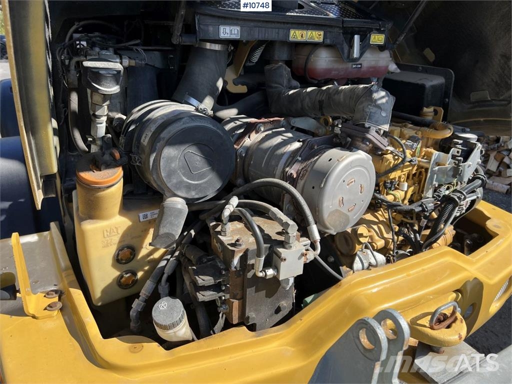 CAT 906M Wheel Loader with Multiple Attachments لوادر بعجل