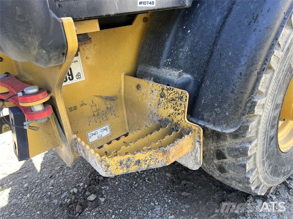 CAT 906M Wheel Loader with Multiple Attachments لوادر بعجل
