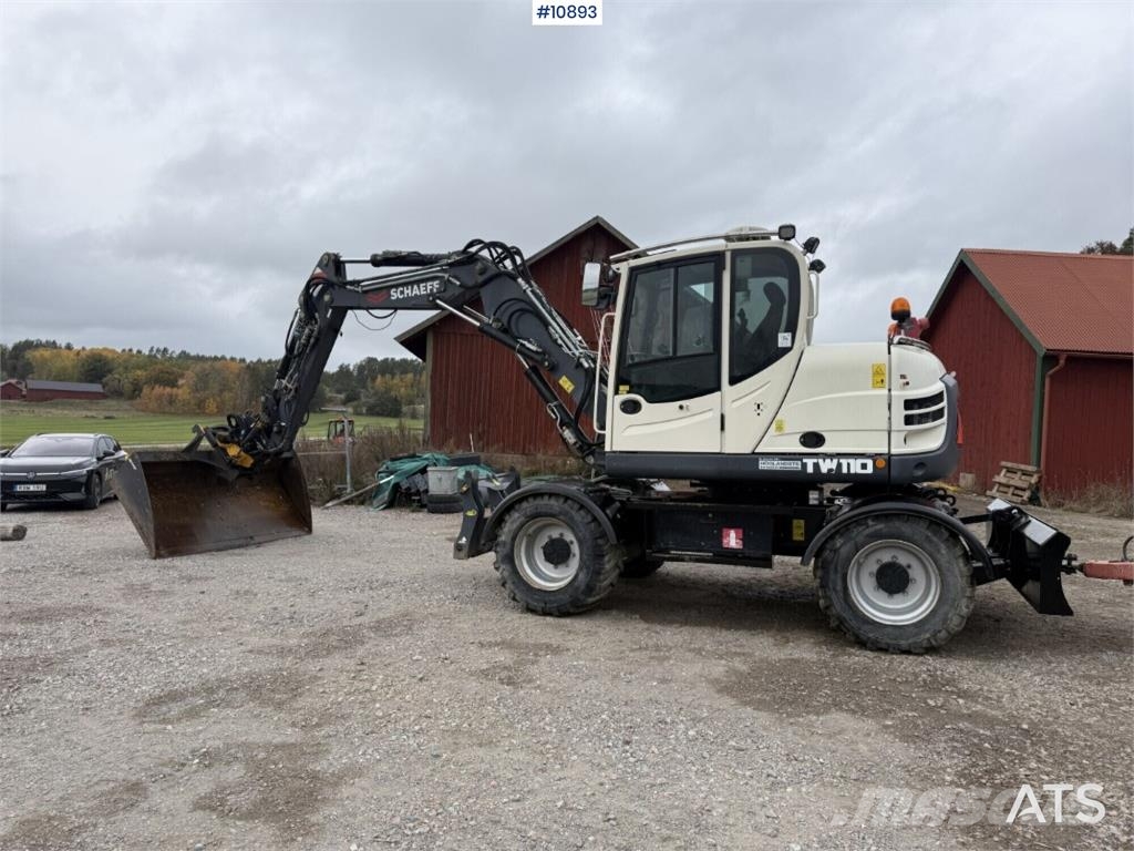 Schaeff TW110 with trailer and attachments Mobilbagger