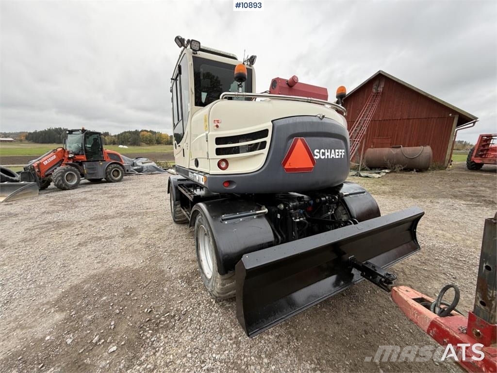 Schaeff TW110 with trailer and attachments Mobilbagger