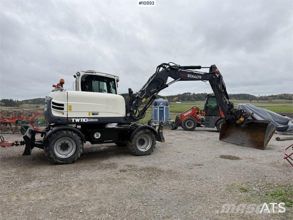 Schaeff TW110 with trailer and attachments Mobilbagger