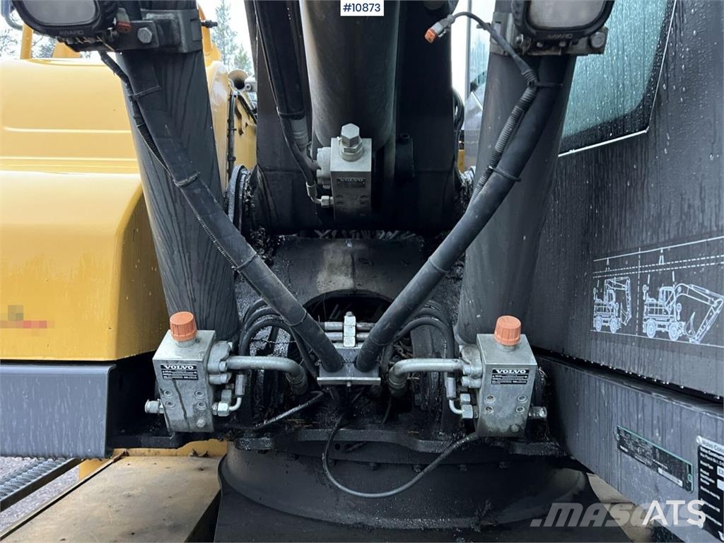 Volvo EW140 D with excavation system, undercarriage, and Hjulgrävare