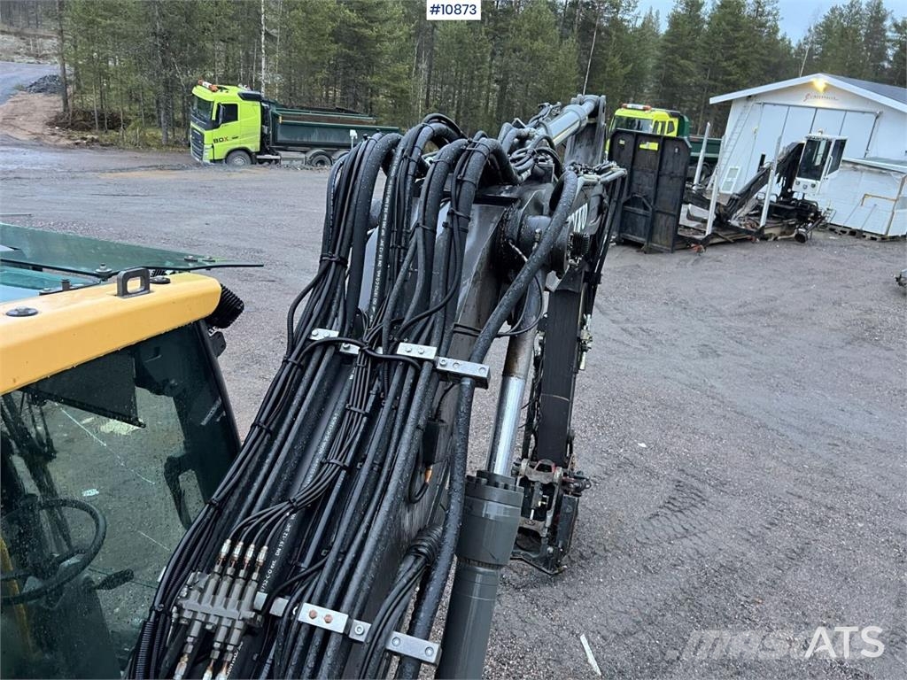 Volvo EW140 D with excavation system, undercarriage, and Hjulgrävare