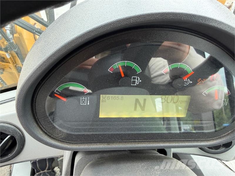 CAT 938m Iekrāvēji uz riteņiem