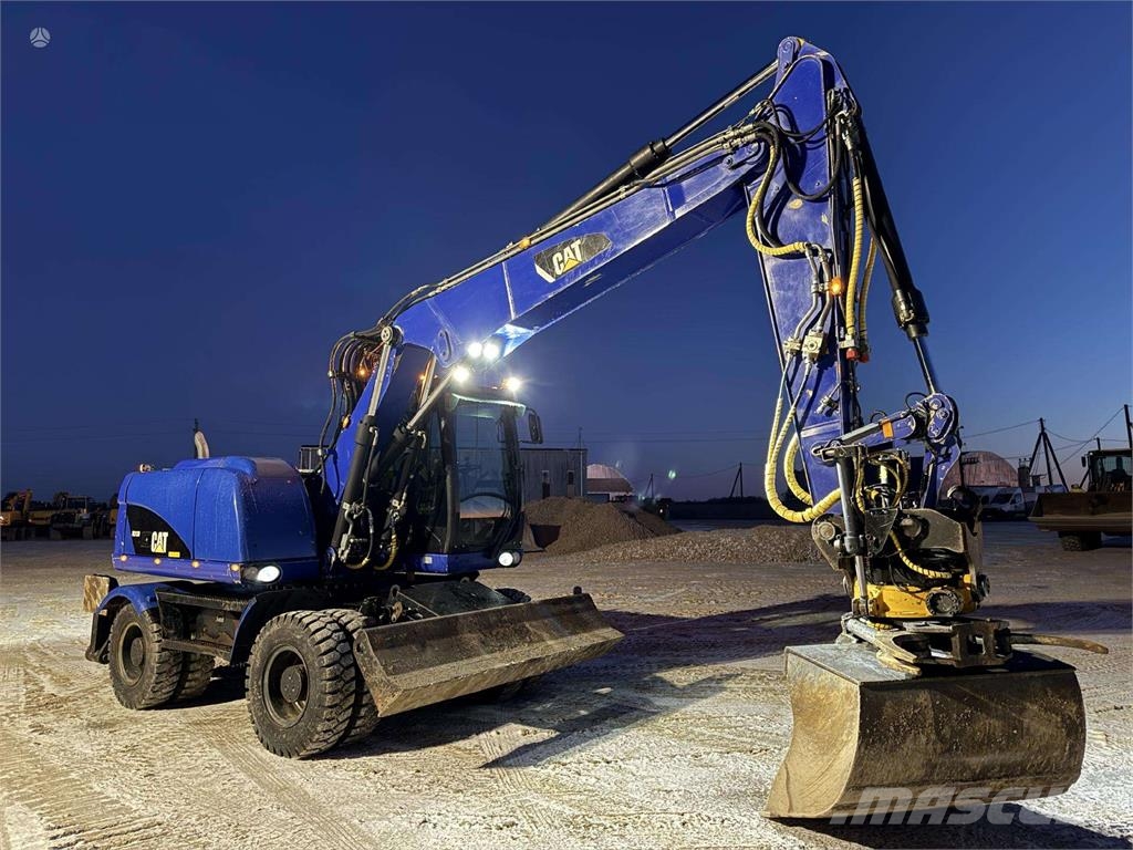 CAT M 313 D Rototilt + Grapple Excavadoras de ruedas