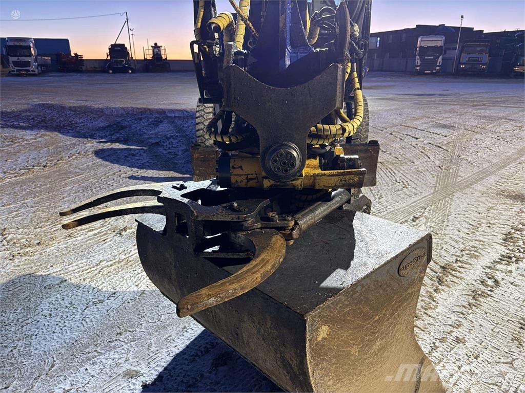 CAT M 313 D Rototilt + Grapple Excavadoras de ruedas