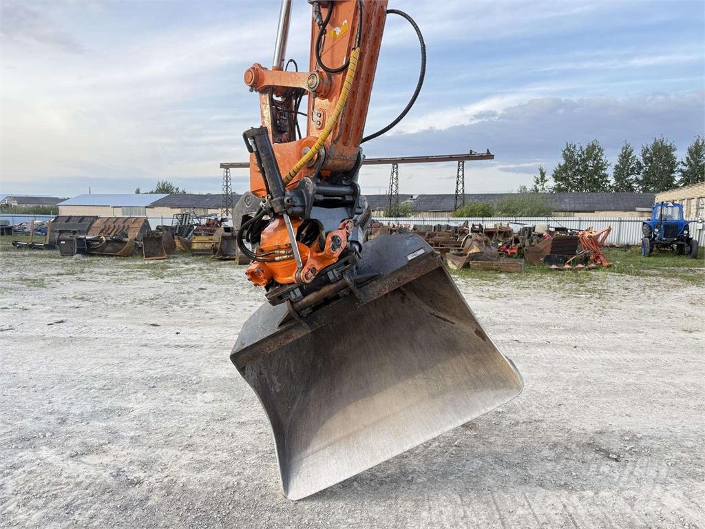 Doosan DX 160 W , ROTO + GRAPPLE Колісні екскаватори