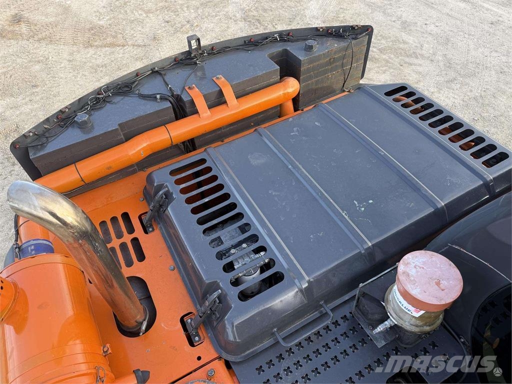 Doosan DX 160 W , ROTO + GRAPPLE Колісні екскаватори