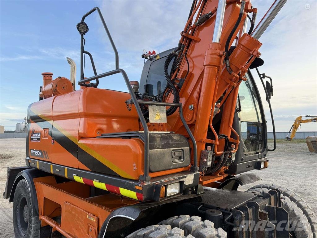 Doosan DX 160 W , ROTO + GRAPPLE Колісні екскаватори