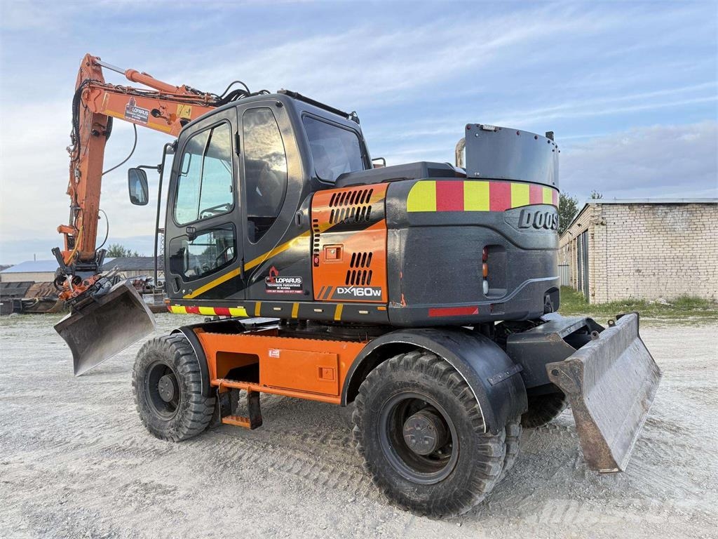Doosan DX 160 W , ROTO + GRAPPLE Колісні екскаватори
