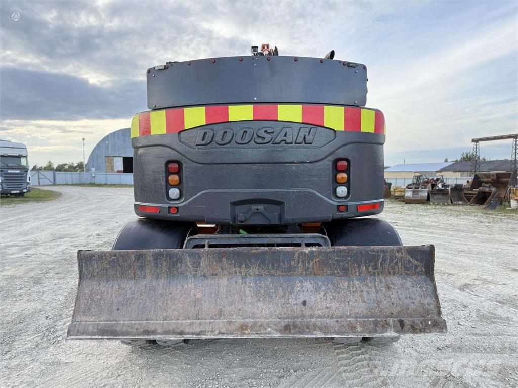 Doosan DX 160 W , ROTO + GRAPPLE Колісні екскаватори