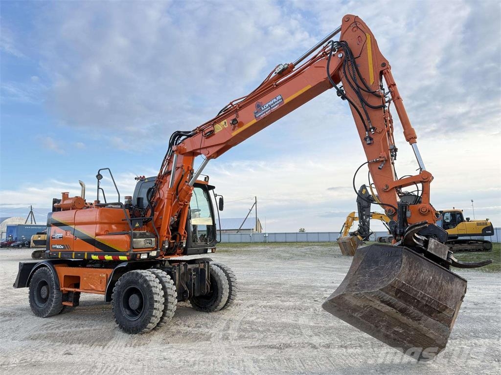 Doosan DX 160 W , ROTO + GRAPPLE Колісні екскаватори