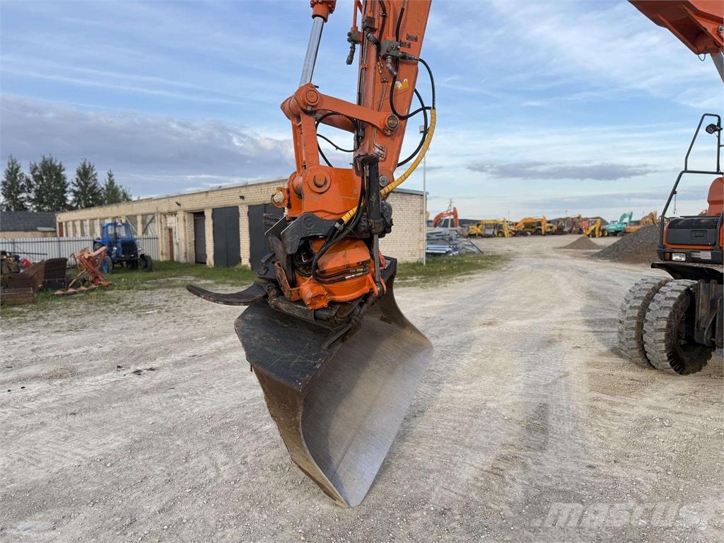 Doosan DX 160 W , ROTO + GRAPPLE Колісні екскаватори