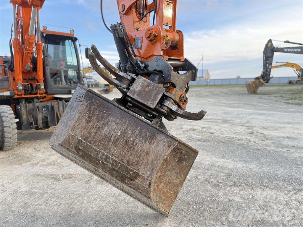 Doosan DX 160 W , ROTO + GRAPPLE Колісні екскаватори