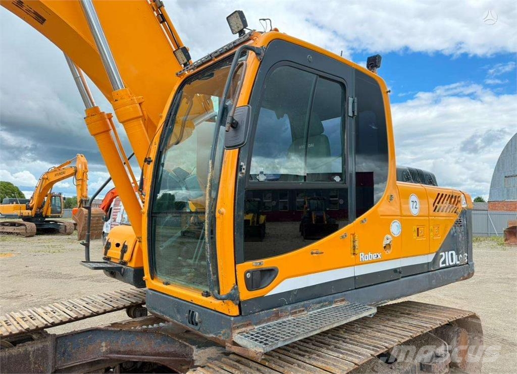 Hyundai Robex 210 LC-9 Гусеничні екскаватори