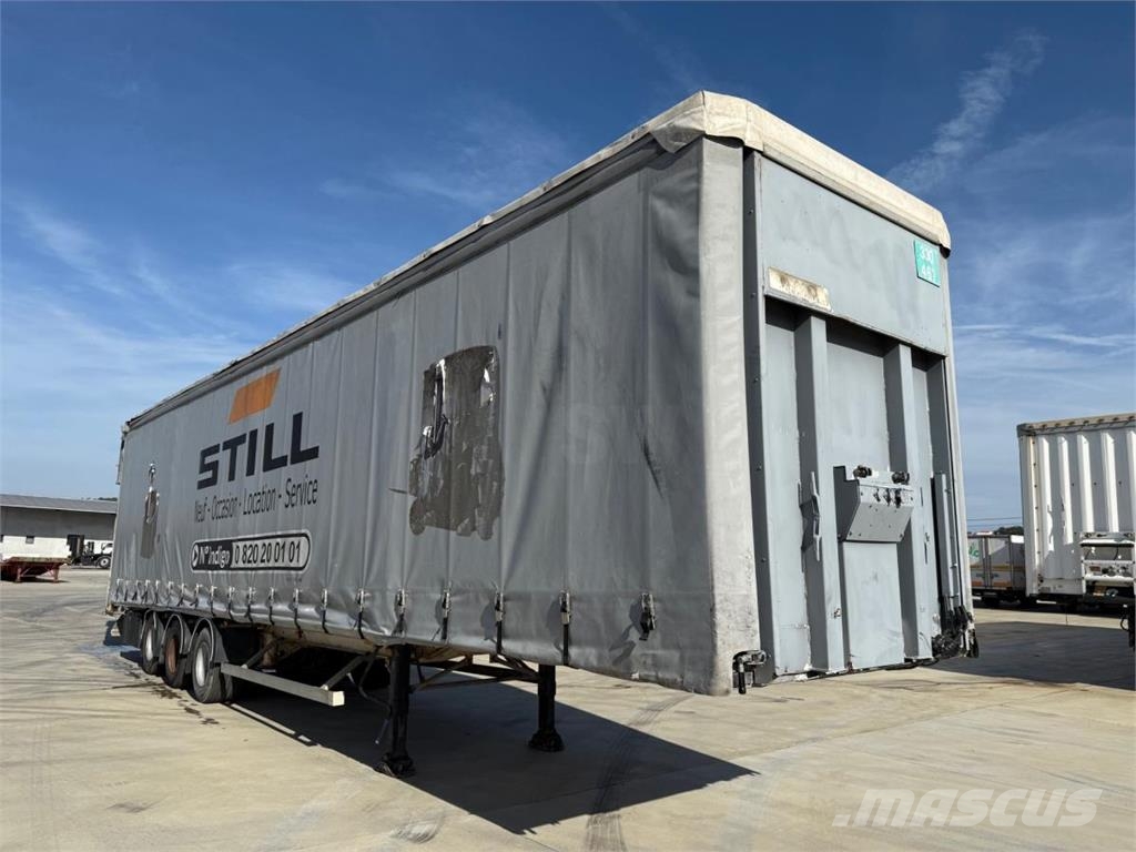 Fruehauf Semi-Reboque نصف مقطورات بباب جانبي