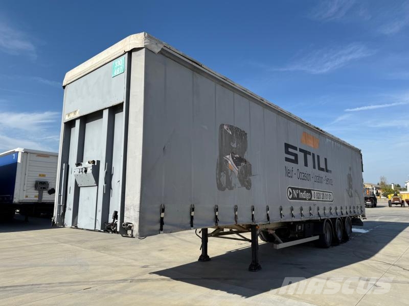 Fruehauf Semi-Reboque نصف مقطورات بباب جانبي