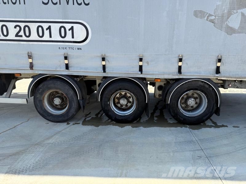 Fruehauf Semi-Reboque نصف مقطورات بباب جانبي