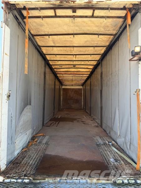 Fruehauf Semi-Reboque نصف مقطورات بباب جانبي