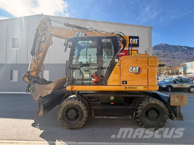 CAT M319-07 / HCS70-5 OK Escavatori gommati