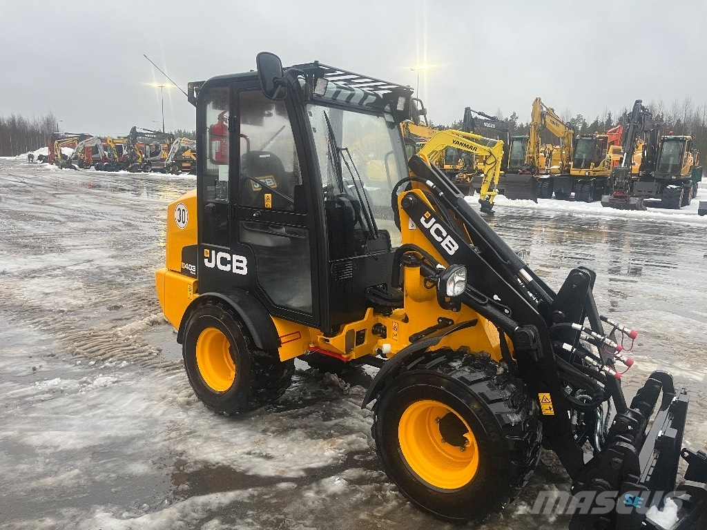 JCB 403 / Kauha, Piikit, 30km/h, Takuu 12kk Iekrāvēji uz riteņiem