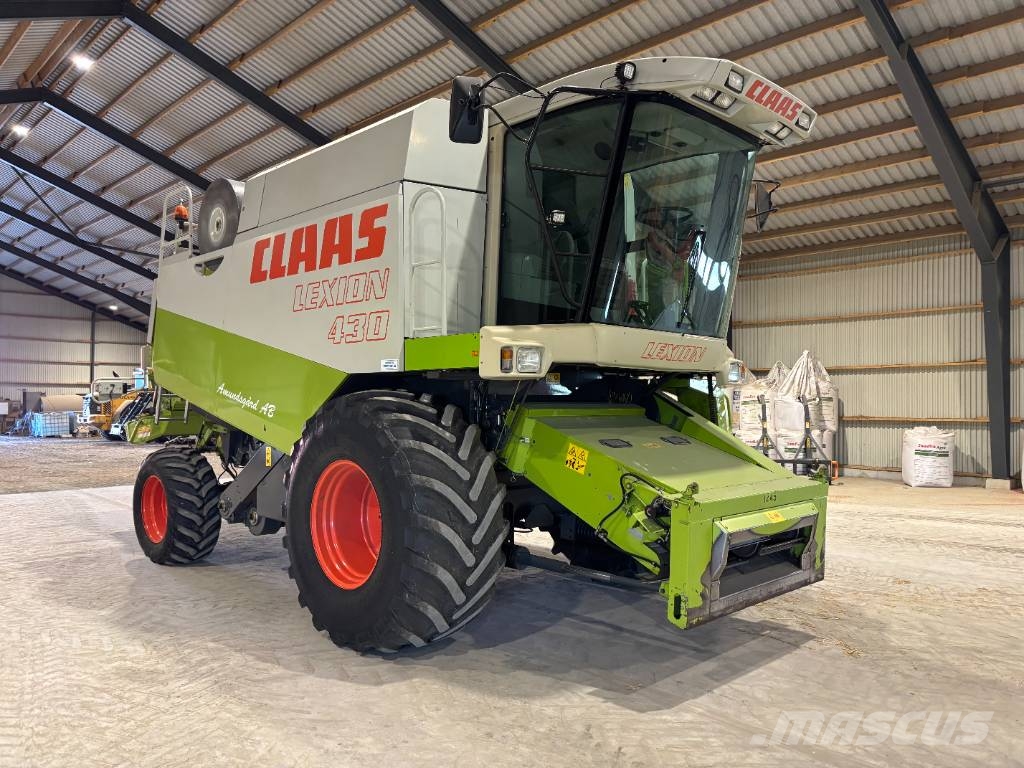 CLAAS Lexion 430 + Skärbord C 600 Mähdrescher