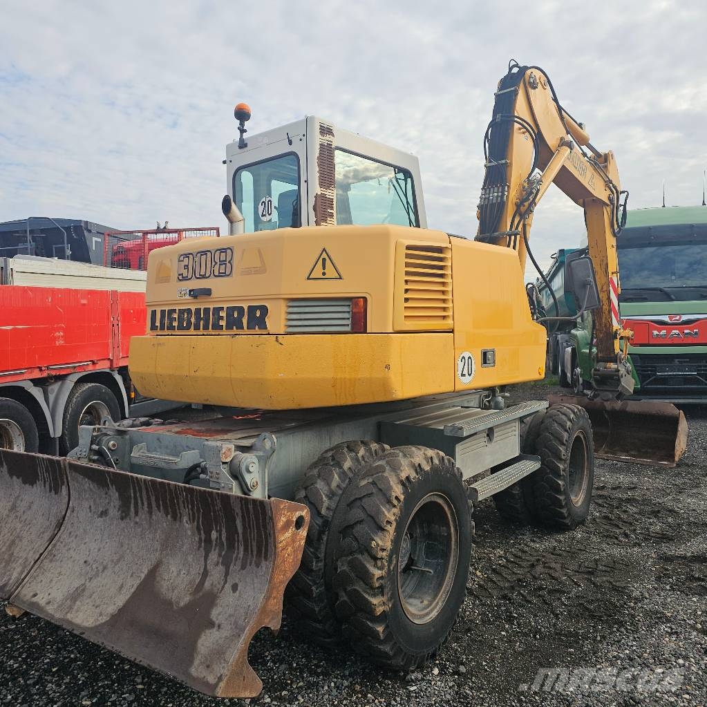 Liebherr 308 حفارات بعجل