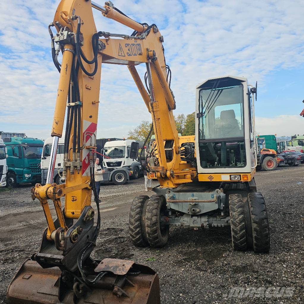 Liebherr 308 حفارات بعجل