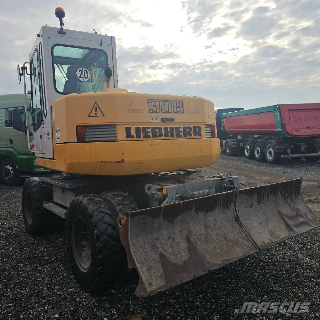 Liebherr 308 حفارات بعجل
