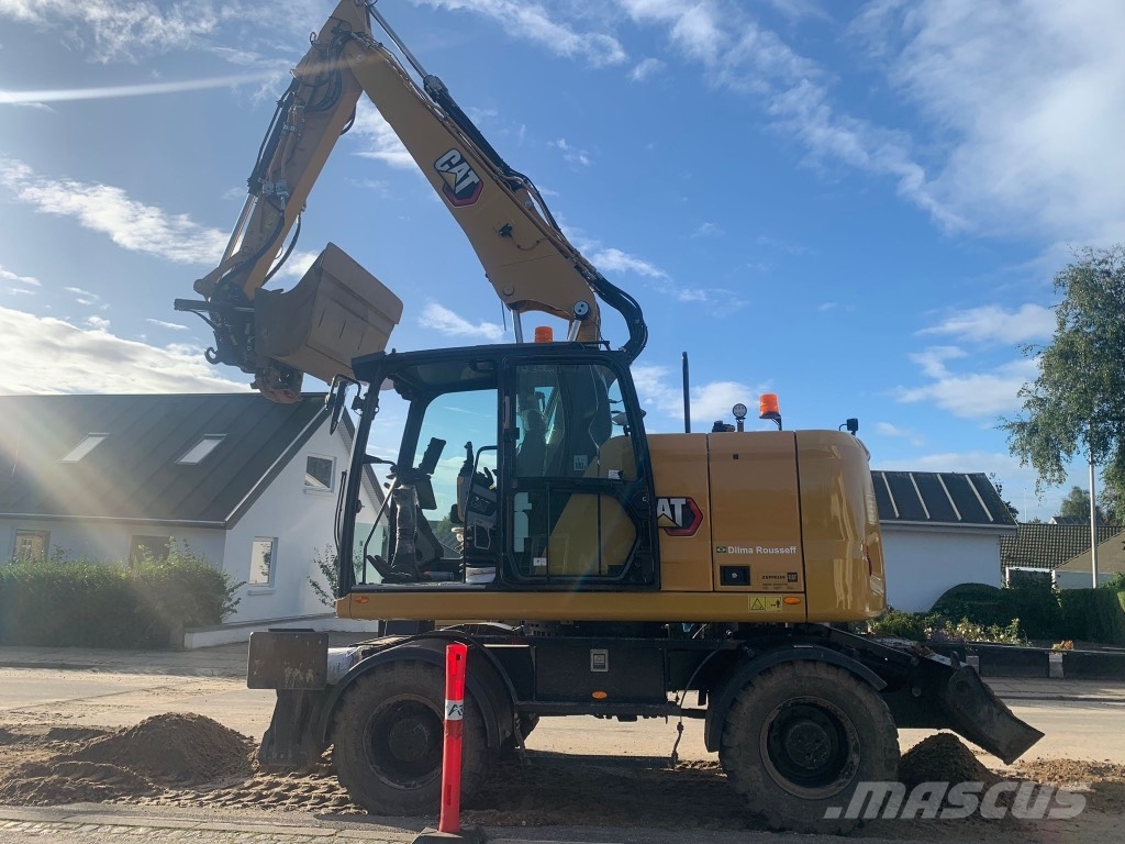 CAT M314 Bagri na kolesih