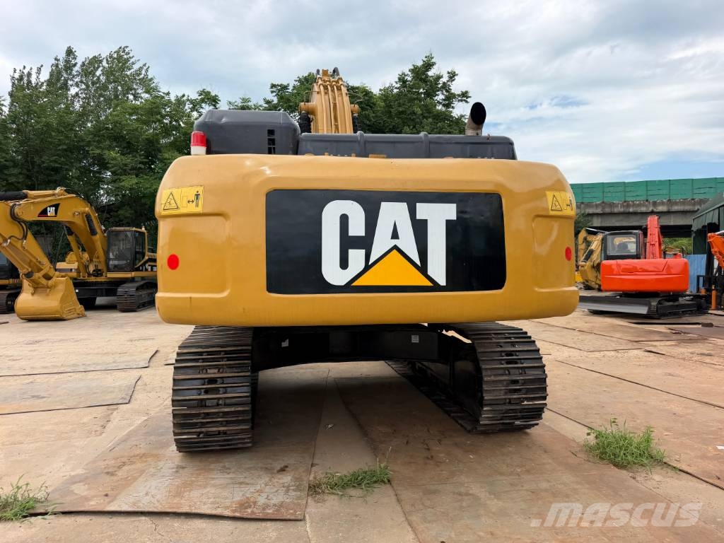 CAT 340D Гусеничні екскаватори