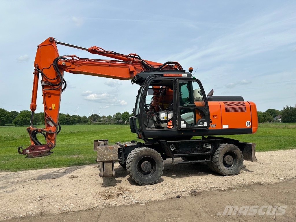 Hitachi OQ 70/55 ZX220W-5B Mobilbagger 旋轉式挖土機/掘鑿機/挖掘機
