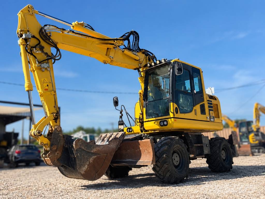 Komatsu PW 148-10 حفارات بعجل