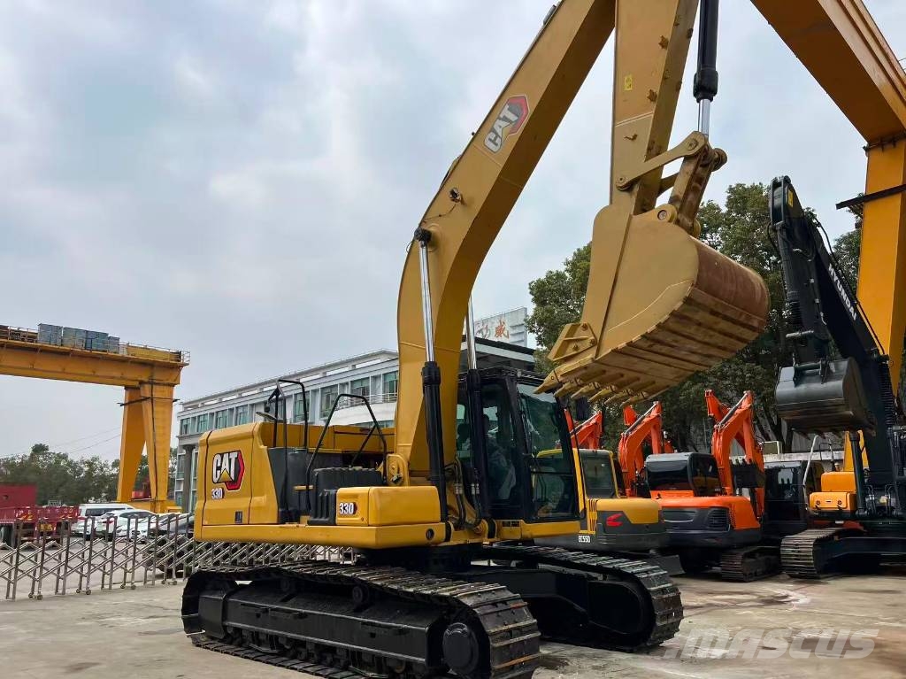 CAT 330 Bagri goseničarji