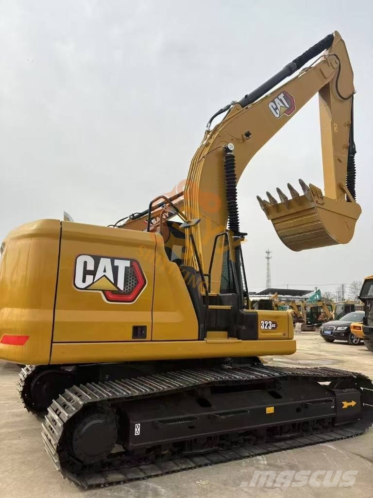 CAT 323 Bagri goseničarji