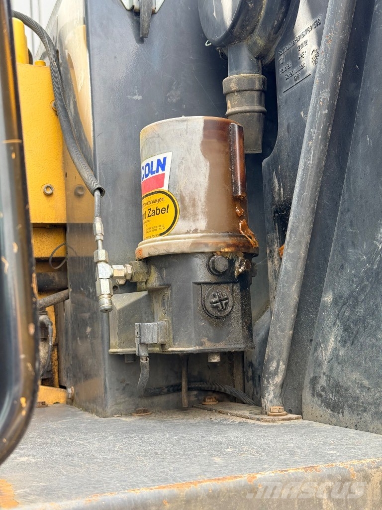 New Holland MH 5.6 Wielgraafmachines