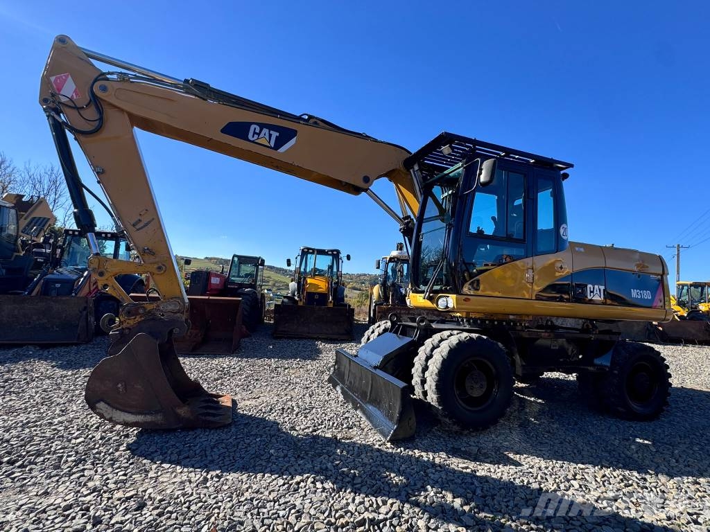 CAT M 318 D Wheeled excavators